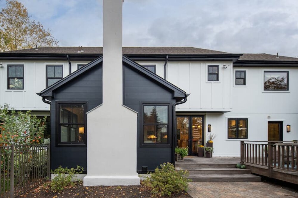 Renovated home exterior with new siding and a welcoming entry