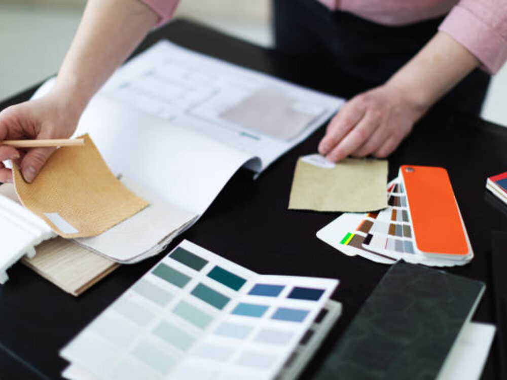 Designer selecting natural material and colour samples
